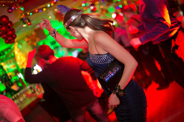 girl dancing at a party in retro style side view