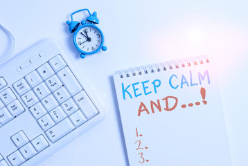 Fototapeta premium Writing note showing Keep Calm And. Business concept for motivational poster produced by British government Keyboard with empty note paper and pencil white background