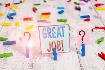 Writing note showing Great Job. Business concept for used praising someone for something they have done well Crumbling sheet with paper clips placed on the wooden table