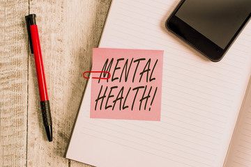 Handwriting text writing Mental Health. Conceptual photo demonstratings condition regard to their psychological well being Thick pages notebook stationary placed above classic look wooden backdrop