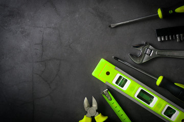handyman services - black and green tools backgound