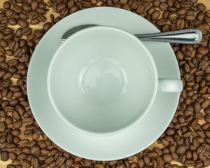 Hot coffee in a cup and coffee  beans