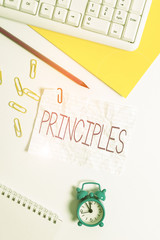 Handwriting text writing Principles. Conceptual photo fundamental truth that serves as the base for a system of belief Flat lay above white blank paper with copy space for text messages