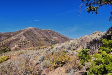 Butterfield canyon hiking path views of the Oquirrh range along the Wasatch Front Rocky Mountains, by Kennecott Rio Tinto Copper mine, Tooele and Salt Lake City fall. Utah, United States.