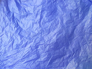 Blue plastic bag texture background, top view macro photography