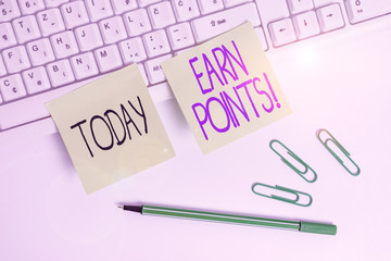 Word writing text Earn Points. Business photo showcasing collecting scores in order qualify to win big prize Square green note paper with pencil on the white background