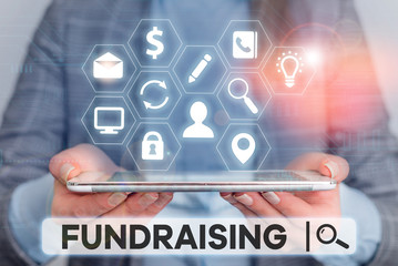 Word writing text Fundraising. Business photo showcasing seeking to generate financial support for charity or cause