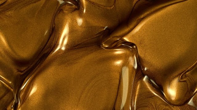 Super Slow Motion Shot of Golden Splashing Background at 1000fps.
