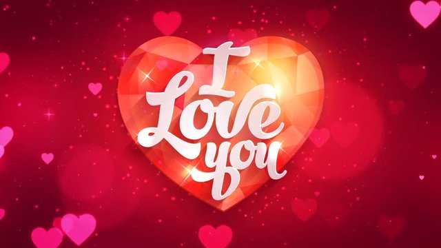 I love you text on red ruby jewel gemstone on blur looped background
