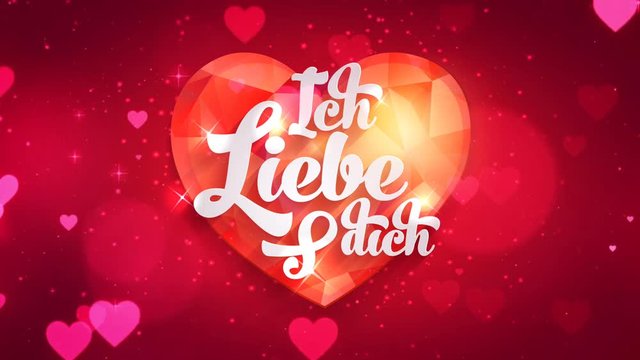 Ich liebe dich - I love you in german language on red ruby jewel gemstone on blur looped background