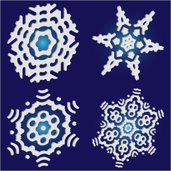 Set of christmas paper snowflakes on blue background.
