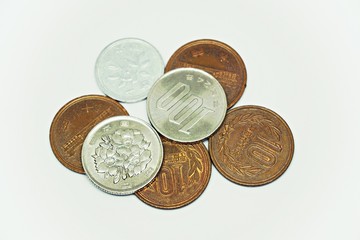 Japan Yen coins on white background