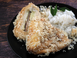 Close up of fried banana. Fried banana (pisang goreng), a popular snack in Malaysia, Singapore, Indonesia and Thailand.