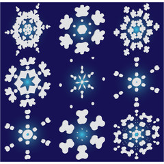 Kit of isolated  silhouettes of snowflakes on blue background.