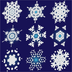 Set of christmas 3d snowflakes on blue background.