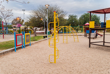 Children kid playground for leisure and recreation activity with toy and slider leftover in the park in childhood color style.