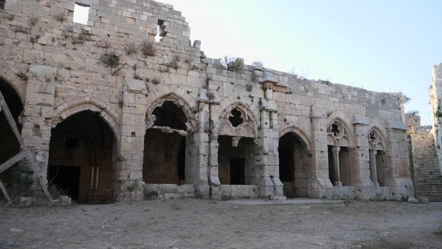 Stationary shot of the historic arched doorways of the Krak des Chevaliers crusader castle in Syria