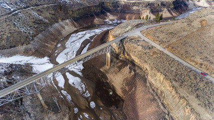 Bridge over an empty canyon during winter