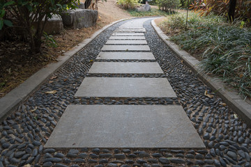 Low angle view of slate and cobblestone path in the park