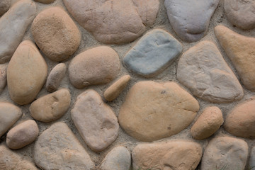 Colorful stone wall texture of various shapes