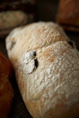 Olive bread, flour on surface