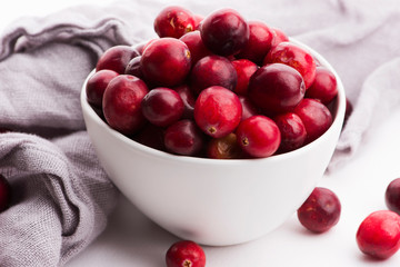 Ceramic bowl of Cranberry on white background