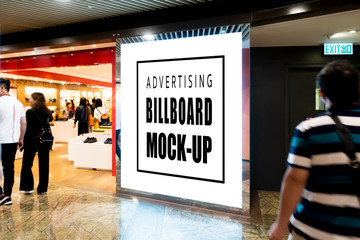 Mock up blank billboard on walkway of metro station