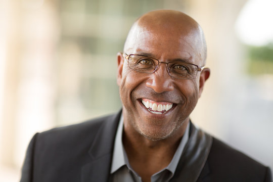 Portrait of a mature African American businessman on his way to work.