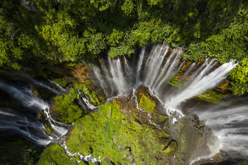 View from above, stunning aerial view of the Tumpak Sewu Waterfalls also known as Coban Sewu....