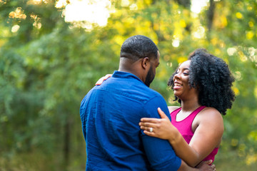 Portrait of a happy pregnant African American couple.