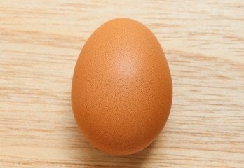 Hen brown egg  freshness  On wood close up isolated space for background texture