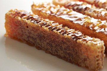 Honey comb on white background 