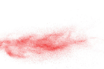 Explosion of red powder on black background
