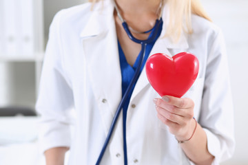 Female medicine doctor hands holding and covering