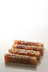 Honey comb on white background 