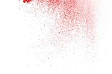 Explosion of red powder on black background