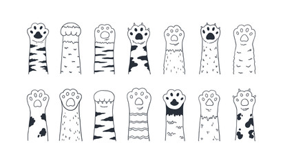 Cat paws. Cute hand drawn dog or kitten claws and paws, cartoon funny kitty and puppy animal foot. Vector set isolated drawings graphics black sketch paw pets on white background