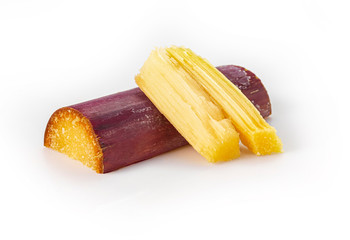 Sliced Sugar cane stalks isolated on white background