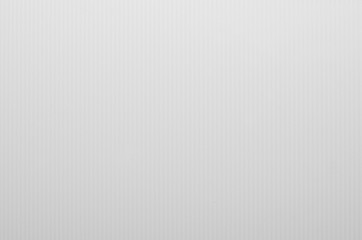 White abstract striped plastic texture with thin lines, vertical.