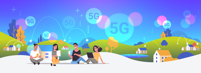 people using digital devices 5G online wireless system connection internet communication concept men women sitting outdoor countryside background full length horizontal vector illustration