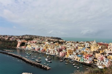 Fototapeta na wymiar Procida island in Italy. Nice view to colorful houses from viewpoint.