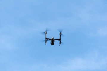 flying drone with camera on the sky