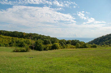 Summer landscape - mountains, forest, clouds