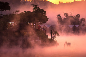 Lake view misty morning Ban Rak Thai Reservoir, Mae Hong Son