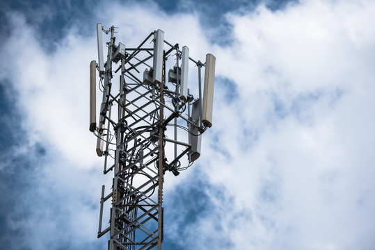 Communication transmitter tower with antenna such a Mobile phone tower, Cellphone Tower, Phone Pole etc on the clear blue sky background with copy space for text, today wide area technoloygy concept. 