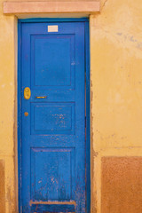 Door with a lock. Urban photo.