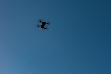 Drone flying over sky background