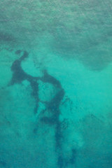 Fototapeta na wymiar Turquoise blue green ocean aerial background