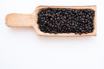 brown and black roasted arabica coffee baens. mashed roasted coffee beans is ingredients of espresso, cappuccino, latte, mocha, americano. coffee is favorite beverage at morning and afternoon break