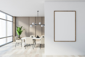 Beige dining room interior with poster